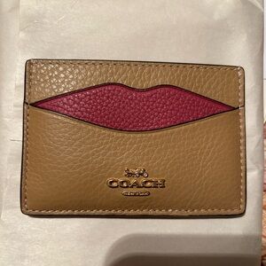 COACH LIP CARD CASE. NWT